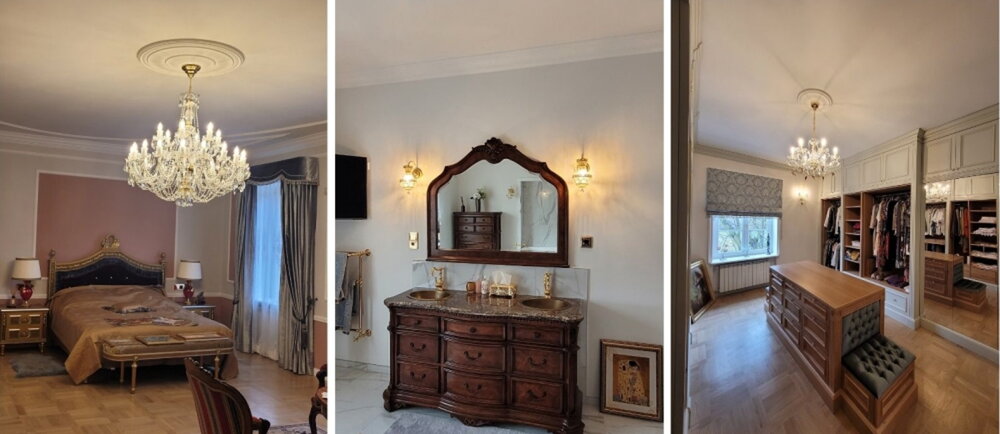 Elegante interior de una villa urbana en Polonia con lámpara de cristal