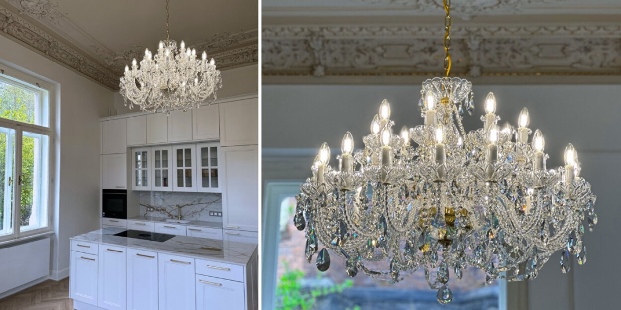 Lámparas de cristal y estucos históricos en casa renovada