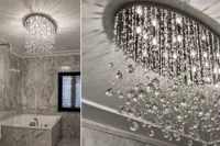 Lámpara de techo moderna con esferas de cristal en cables en un lujoso baño de mármol con bañera y detalle de los cristales en cascada