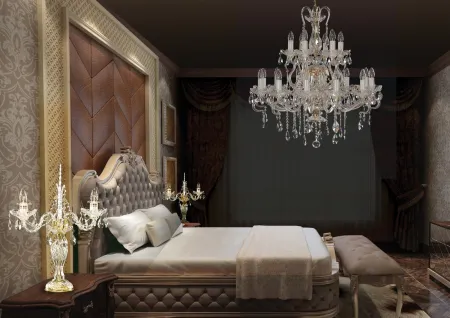 Table lamps and chandelier in bedroom